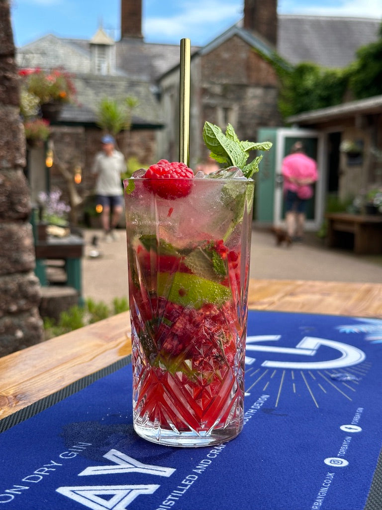 Raspberry Gin Mojito on the Bar Outside Shop